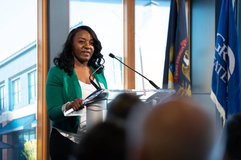 A student speaking at the Lynn M. Blue Connection Naming Ceremony